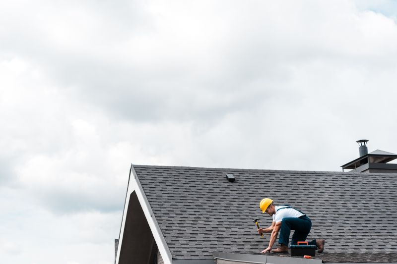 Roofing Contractor at Work
